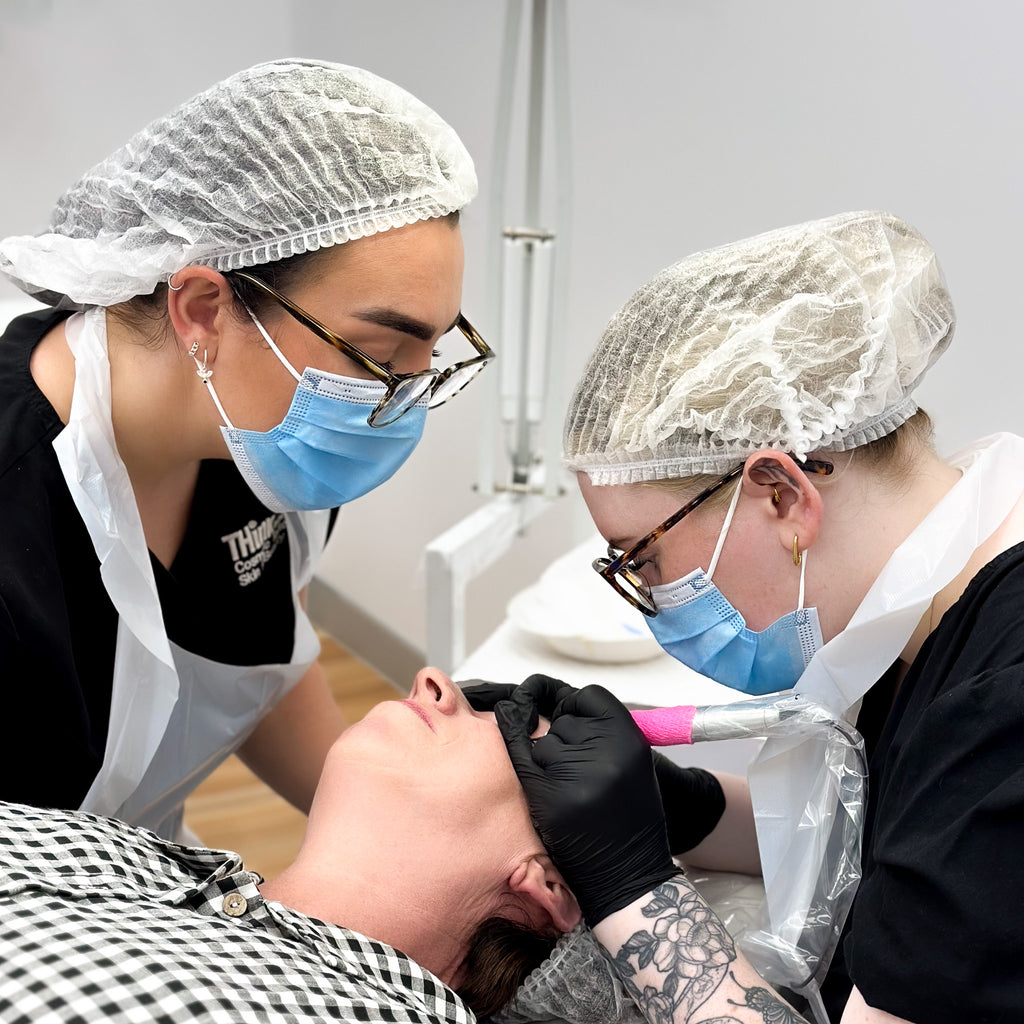 Alice from THink Aesthetics with student during Eyeliner Procedure